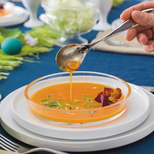 Bouillon de carotte aux langoustines