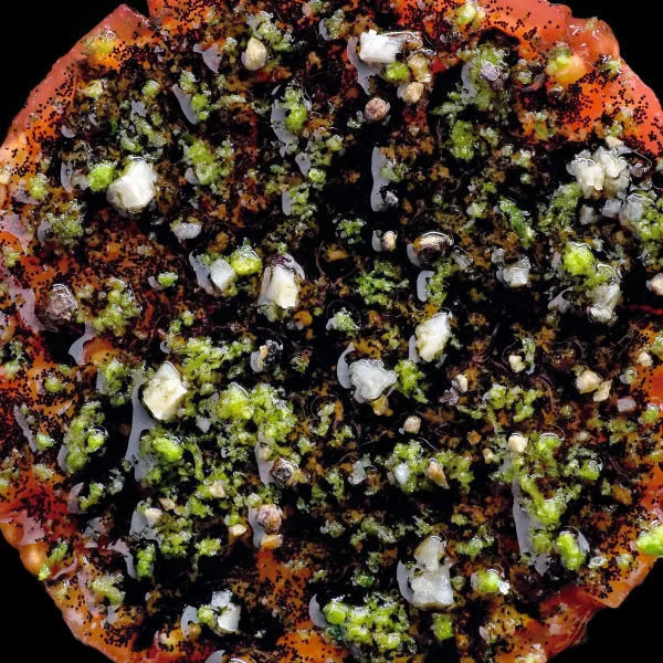 La tomate en salade, huile d’olive parfumée à la vanille et zestes de citron vert